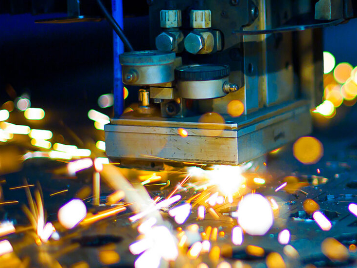 close up of machine with sparks